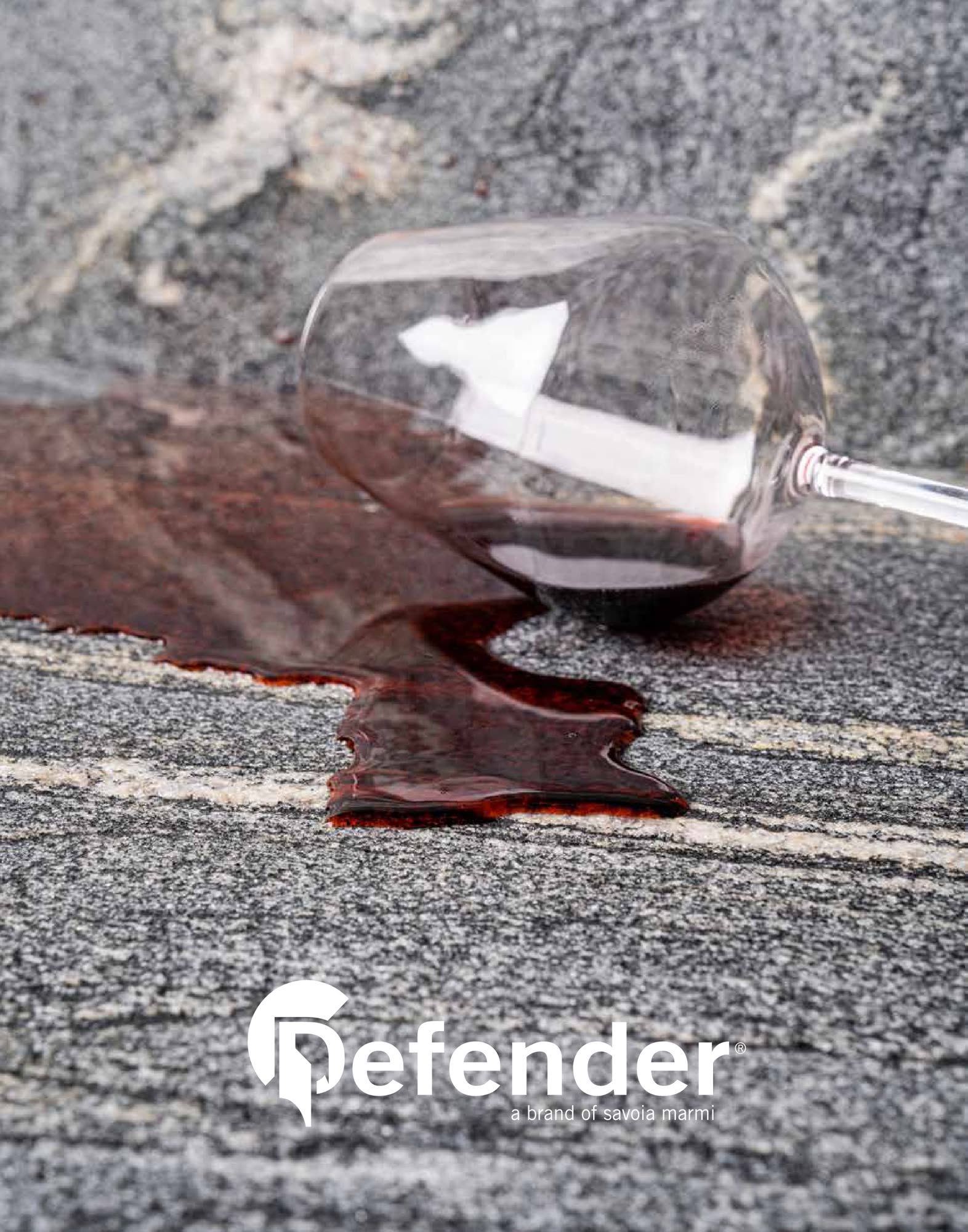 Vino rosso versato su una lastra trattata Defender